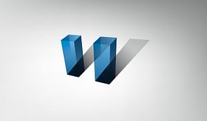 Logo resembling two translucent blue towers casting shadows to make the letter W on a gray gradient background.